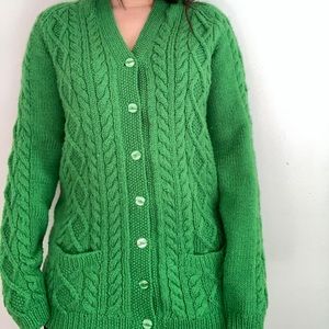 This green hand knit sweater.